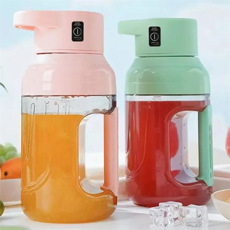 Shopi Vella portable electric juicer blender in pink and green with juice inside and ice cubes nearby