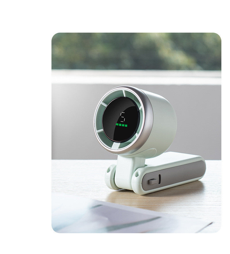 Shopi Vella portable mini fan rechargeable with digital display and compact foldable design on wooden desk