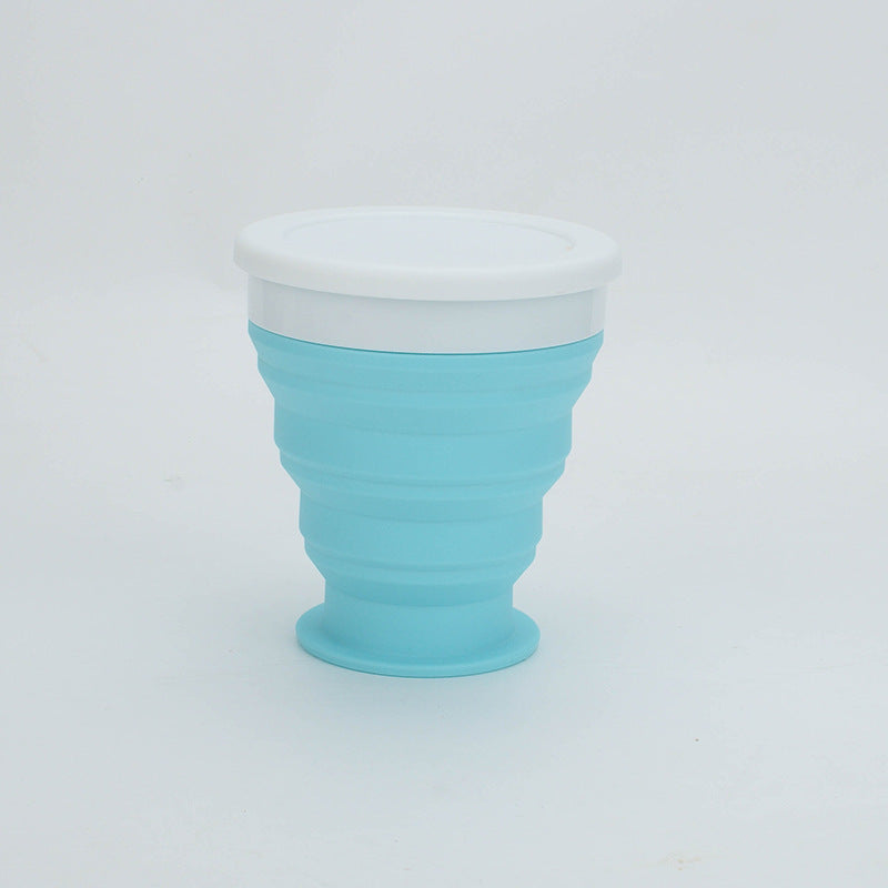 Shopi Vella portable silicone lunch box in blue with white lid for compact home storage