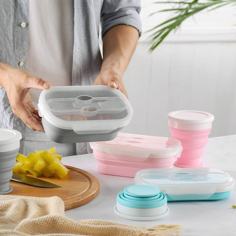 Shopi Vella portable silicone lunch box in gray, pink, and blue with collapsible design for easy home storage