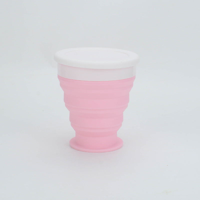 Shopi Vella portable silicone lunch box in collapsible pink design with white lid for home storage