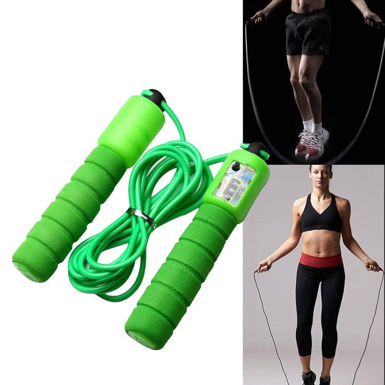 Green portable sports training skipping rope with foam handles for effective fitness workouts
