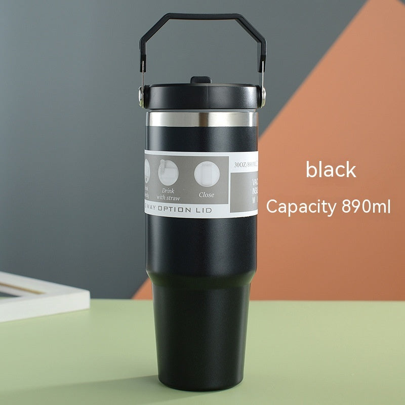 Black portable stainless steel travel mug with handle and 890ml capacity by Shopi Vella