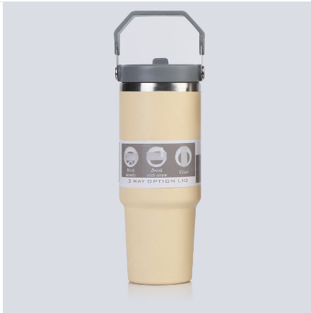 Shopi Vella portable stainless steel travel mug in beige with gray handle and lid for easy carrying