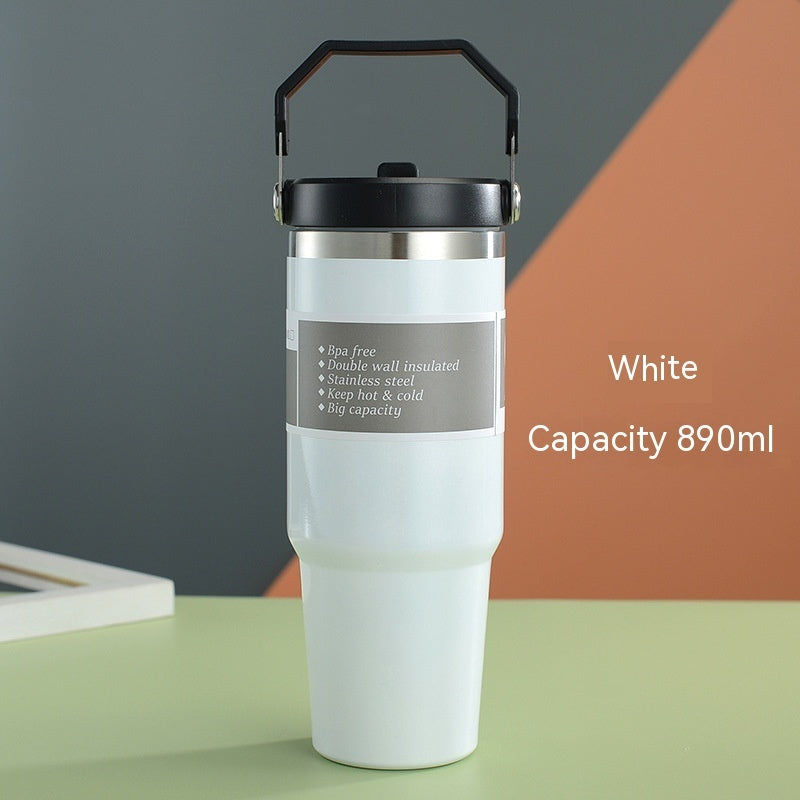 White portable stainless steel travel mug with black handle and 890ml capacity by Shopi Vella