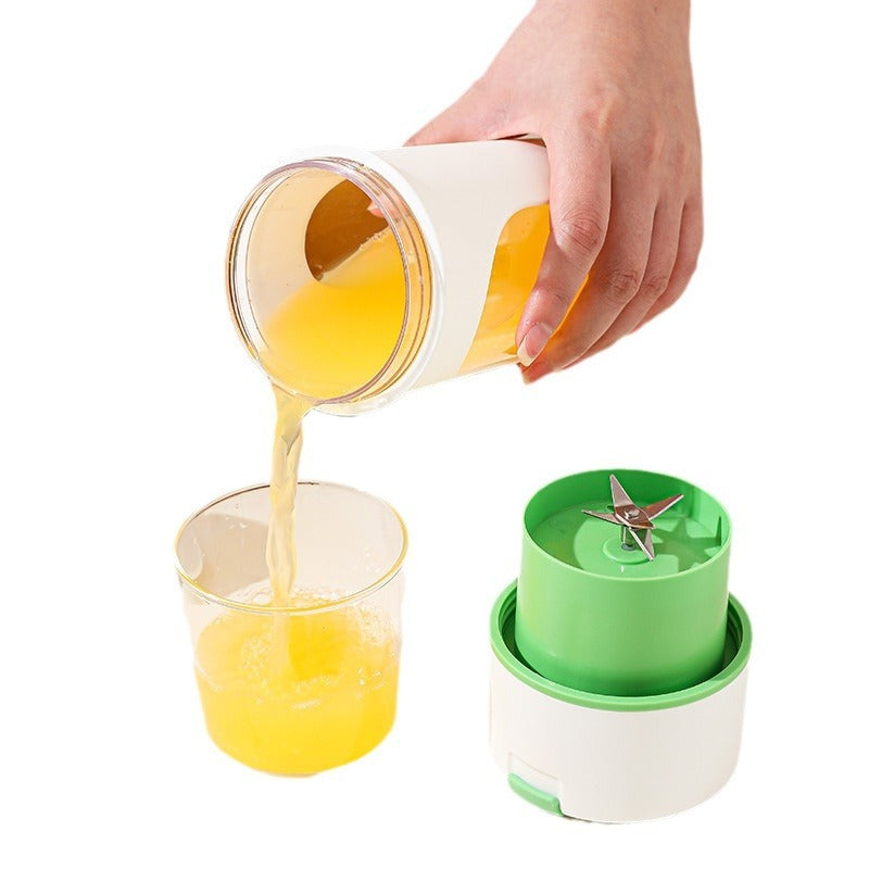 Shopi Vella wireless portable juicer cup pouring fresh orange juice with detachable blade base