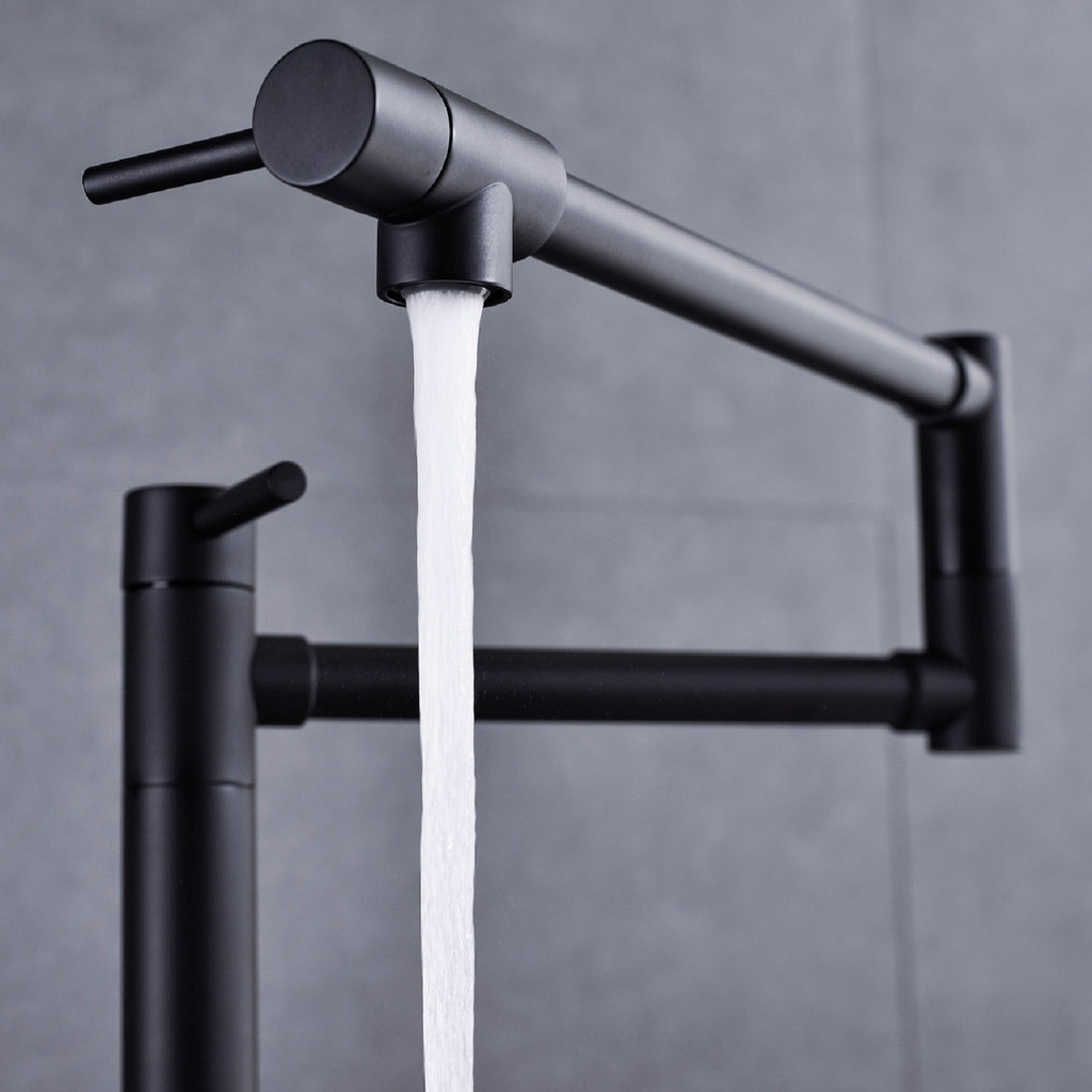 Shopi Vella black pot filler faucet with extended handle mounted on a gray tiled wall
