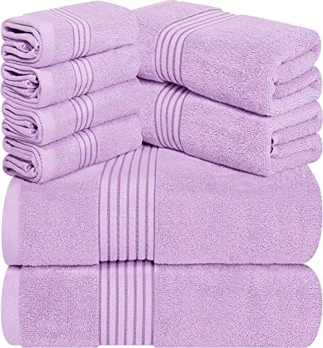 Lavender premium 8-piece bathroom towels set with striped detail neatly stacked for bathroom use