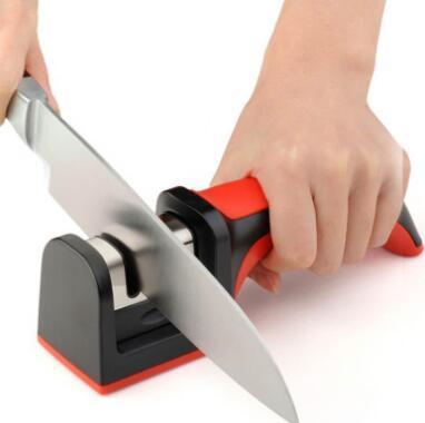 Shopi Vella professional knife sharpener with red and black handle sharpening kitchen knife