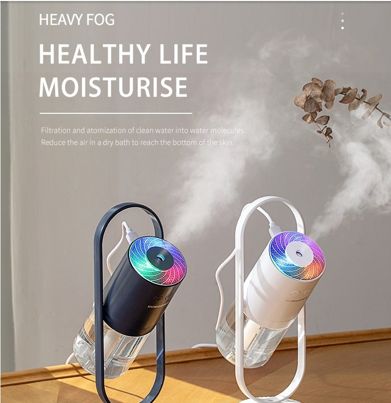 Shopi Vella projection night light humidifier for bedroom in black and white with colorful LED light and mist output