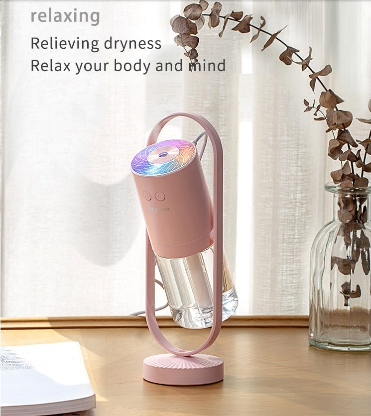 Shopi Vella projection night light humidifier for bedroom in pink with modern design and colorful light
