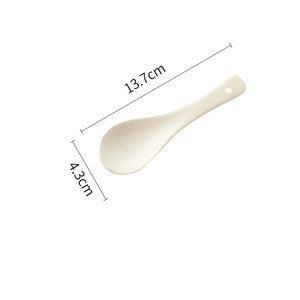 Shopi Vella pure color ceramic plate spoon in white with ergonomic handle and smooth finish