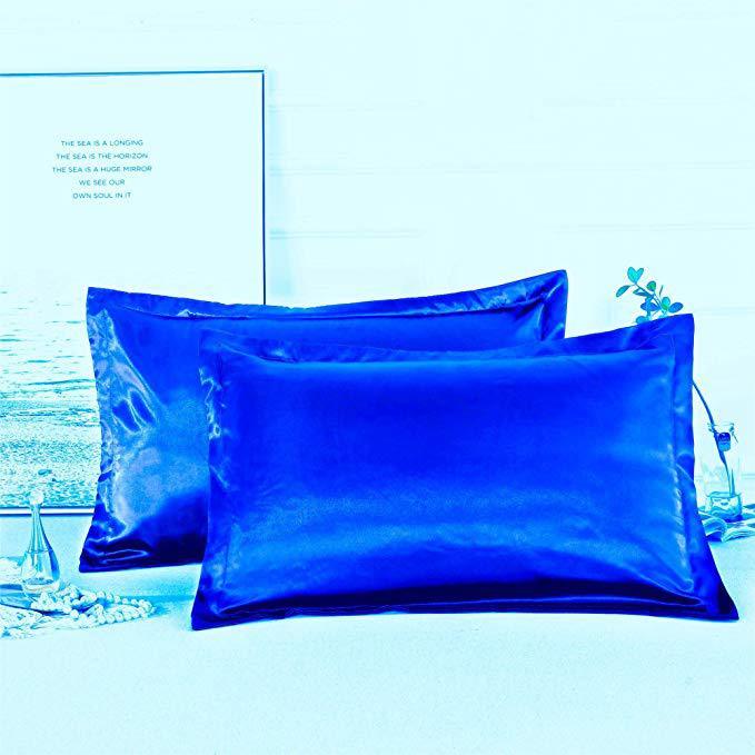 Shopi Vella vibrant blue pure silk pillow case set with smooth and shiny texture on white surface