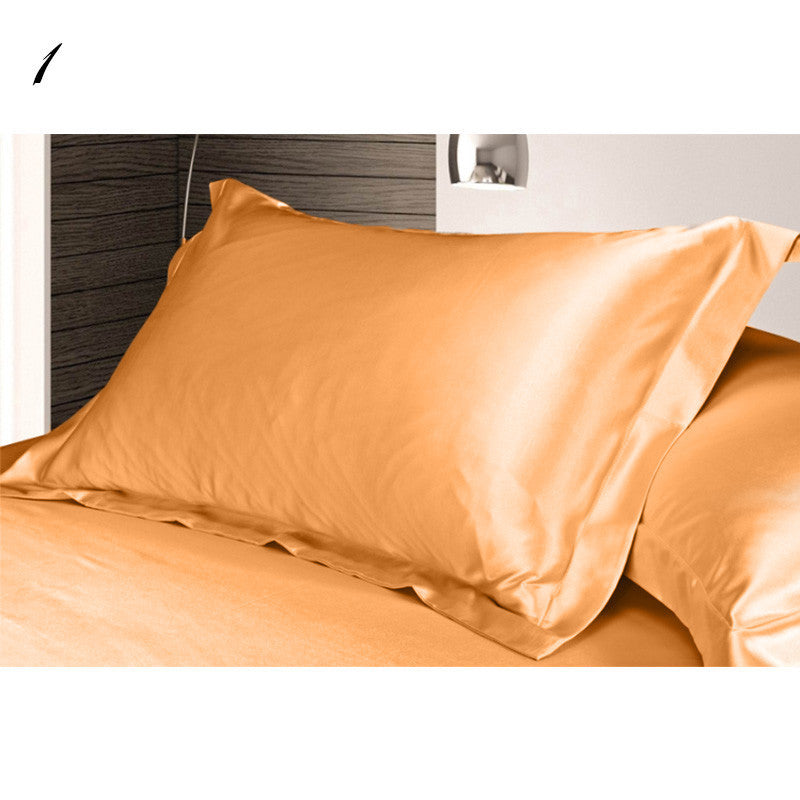 Shopi Vella golden brown pure silk pillow case on bed with smooth luxurious texture