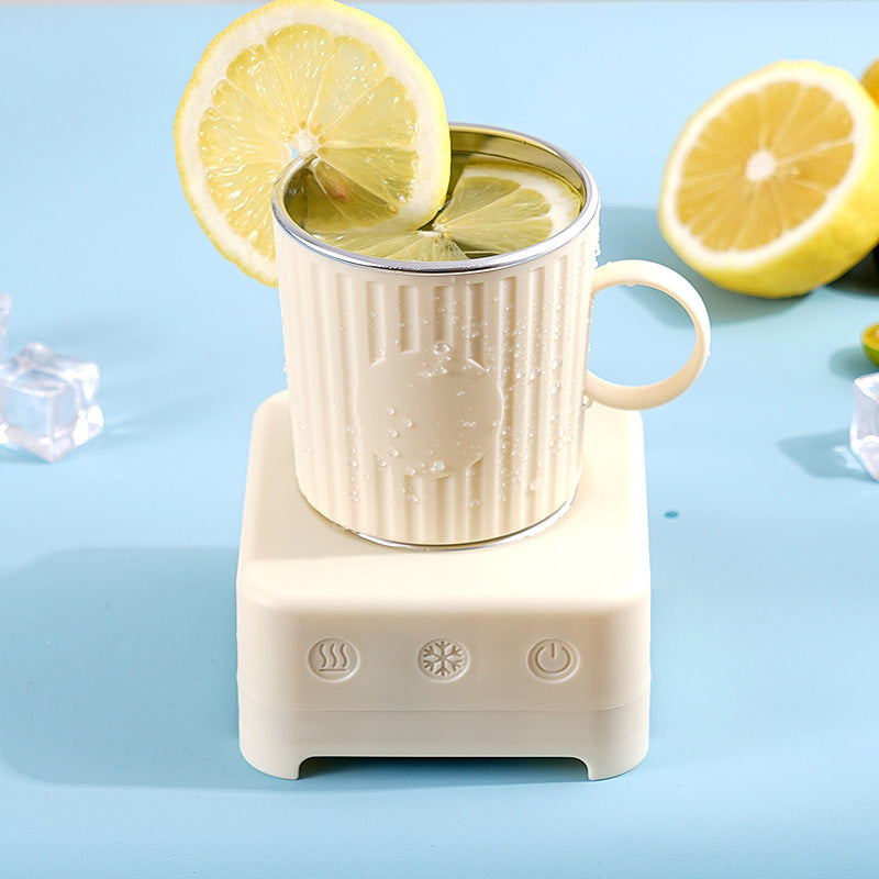 Shopi Vella quick beverage ice maker machine with cream cup and lemon slices on light blue background