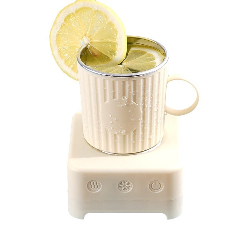 Shopi Vella quick beverage ice maker machine with a cup of lemon water on top for kitchen storage