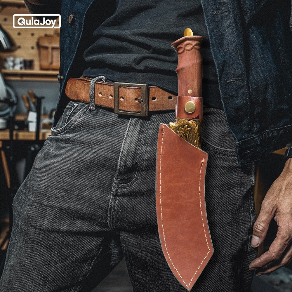 Dragon head camping knife with leather sheath attached to belt worn by person in casual outfit