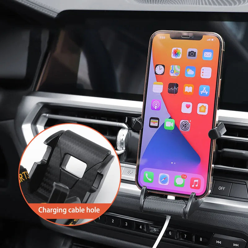 Shopi Vella racing seat car phone holder mounted on car air vent with cable hole for charging