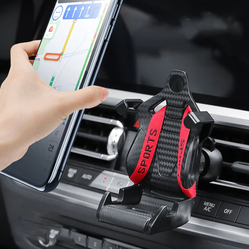 Shopi Vella racing seat car phone holder installed on a car air vent holding a smartphone