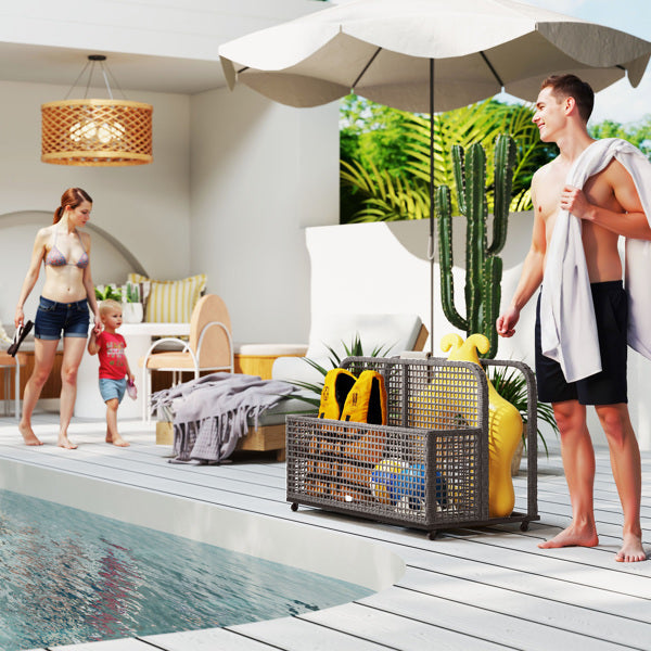 Outdoor rattan storage basket for home by Shopi Vella near poolside with towels and toys inside