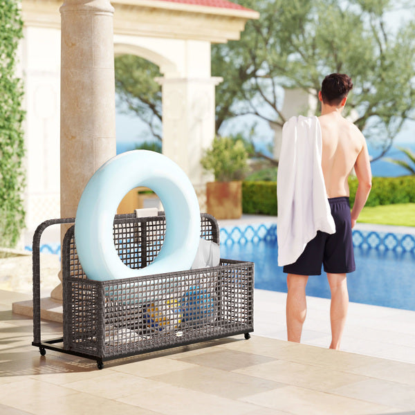 Shopi Vella rattan storage basket for home holding pool accessories next to a swimming pool