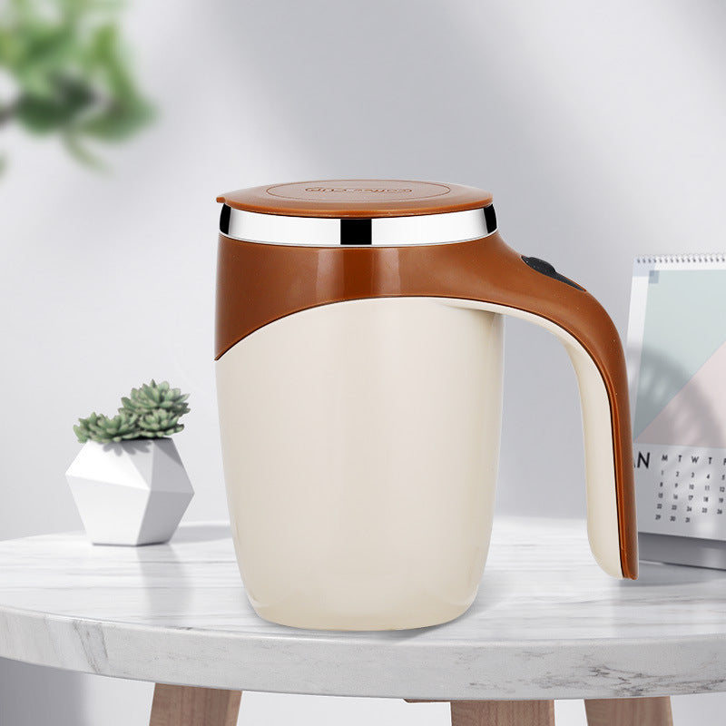 Shopi Vella rechargeable automatic stirring cup in beige and brown on marble table with plant and calendar