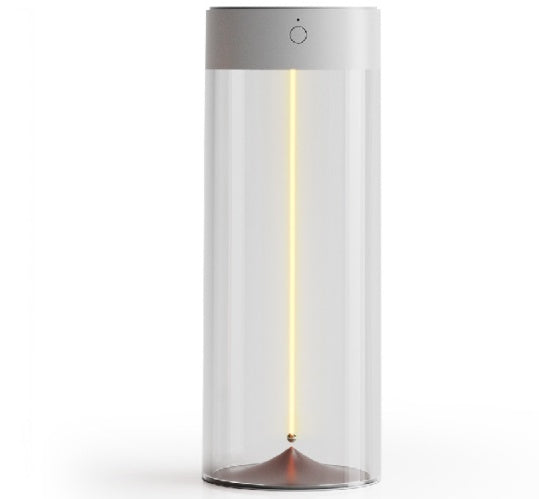 Shopi Vella rechargeable LED camping light in a sleek transparent cylindrical design for home storage