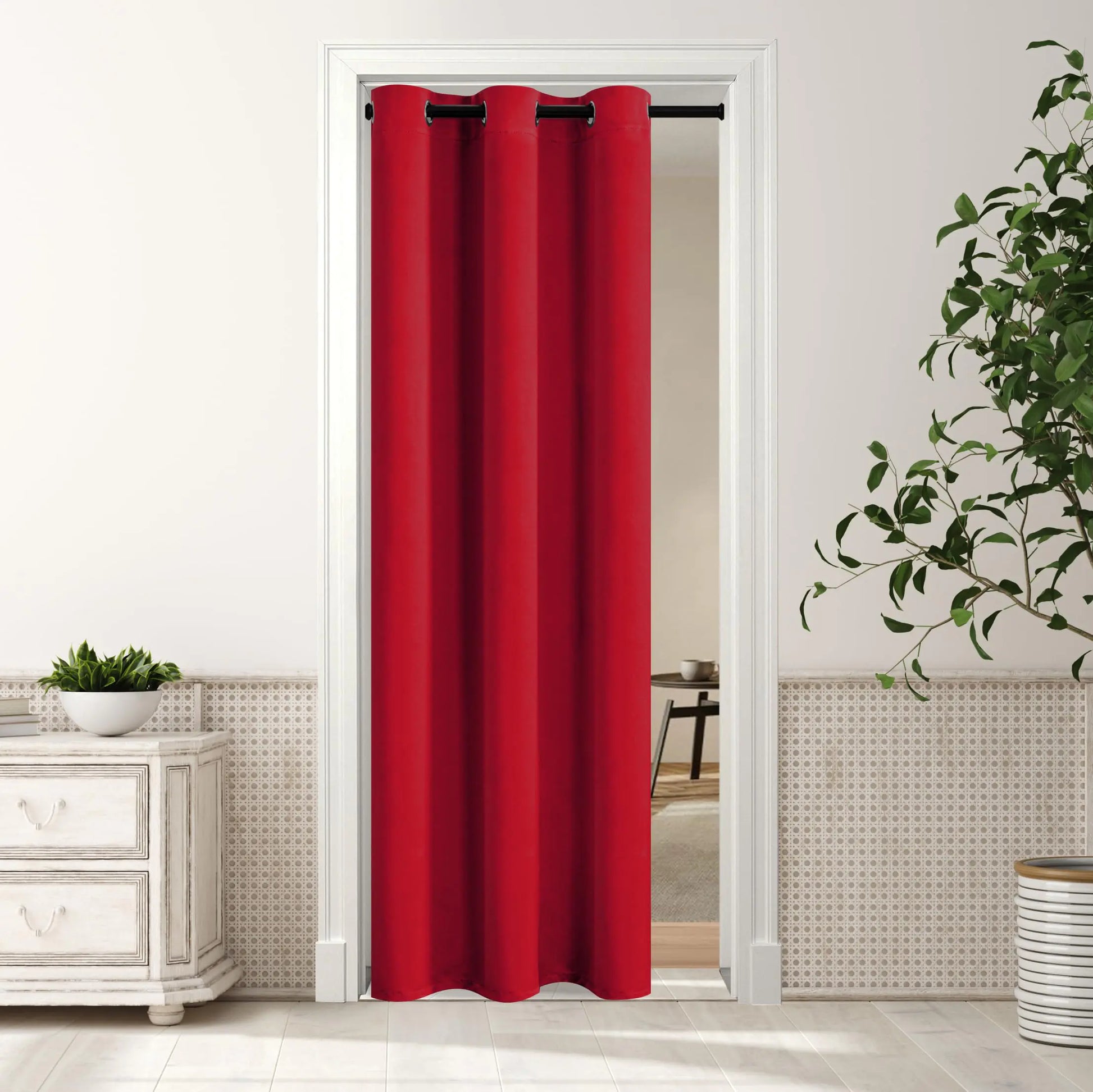 Red thermal insulated bedroom curtains hanging in a doorway with modern home decor