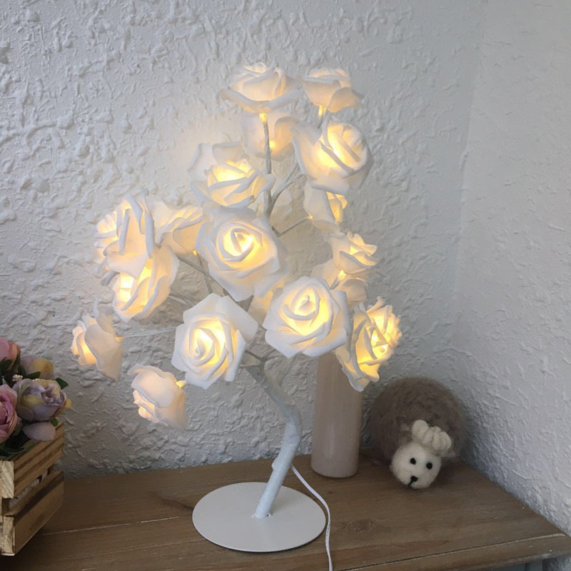 Shopi Vella rose flower LED night lamp with glowing white roses on a white stand for home storage decor