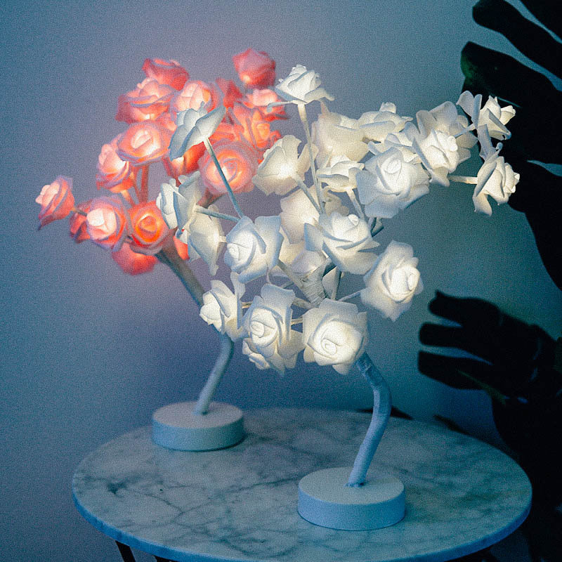 Shopi Vella decorative rose flower LED night lamp in white and warm pink on marble table