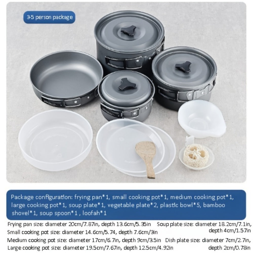 Shopi Vella RV camping pot set with frying pan, small and medium cooking pots, plates, bowls, and cooking utensils