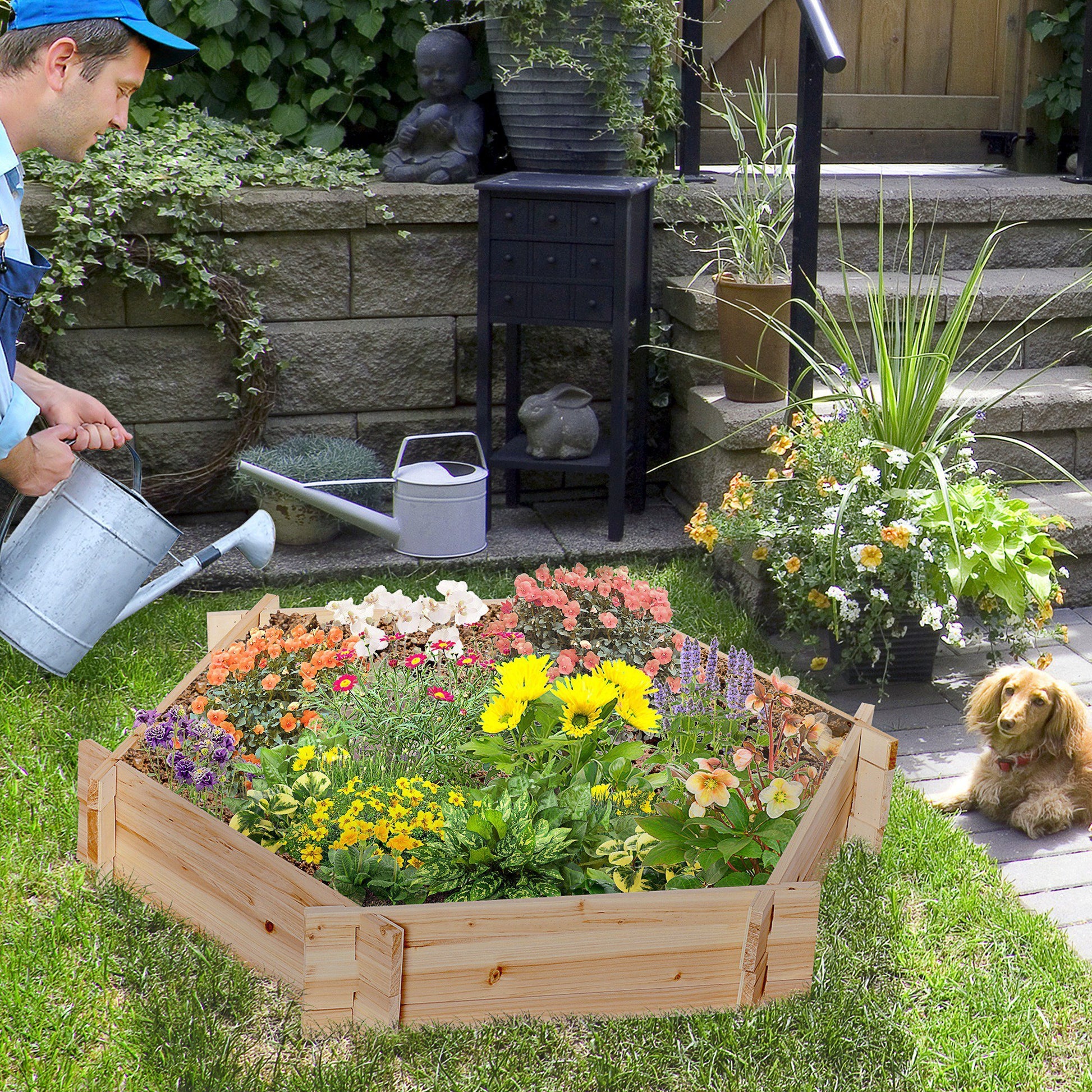 Shopi Vella screwless raised garden bed made of wood filled with colorful flowers in backyard garden