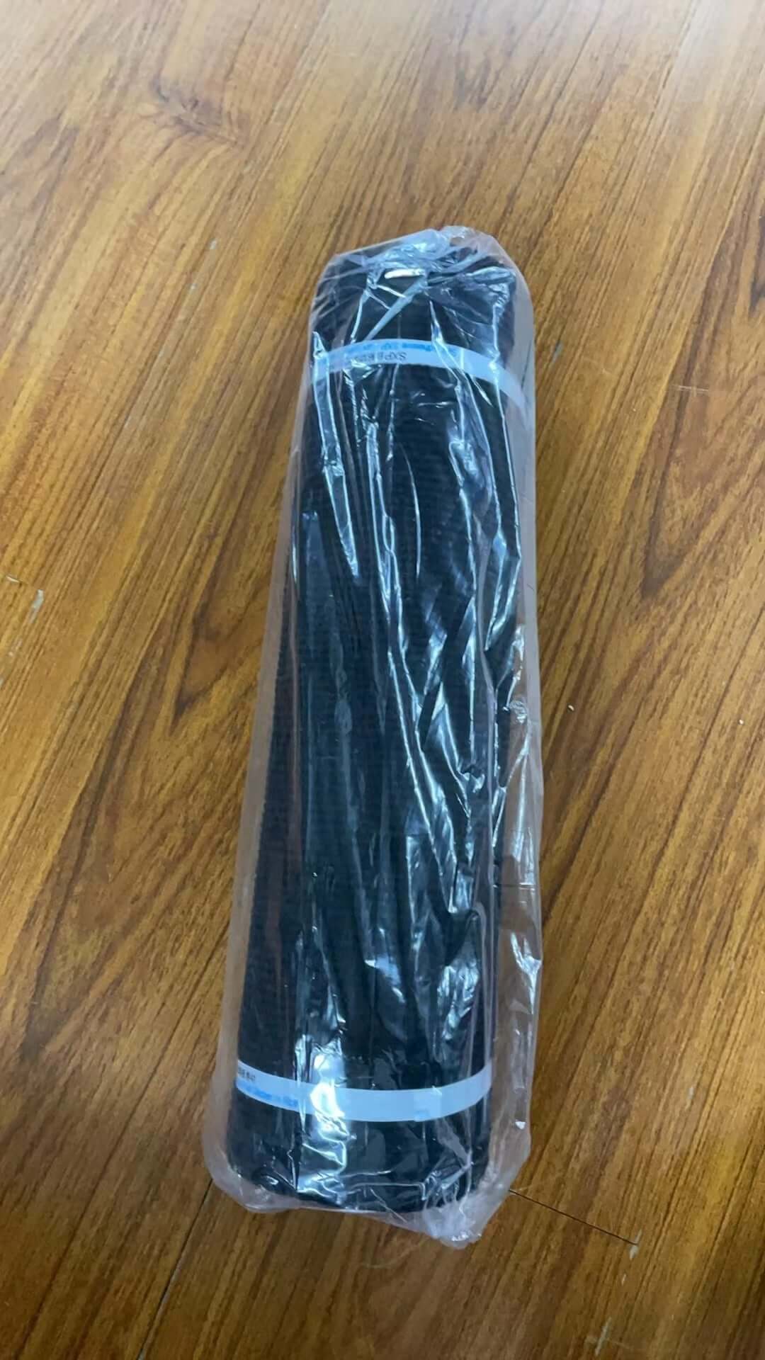 Shopi Vella self-adhesive cat scratch board rolled and packaged in clear plastic wrap