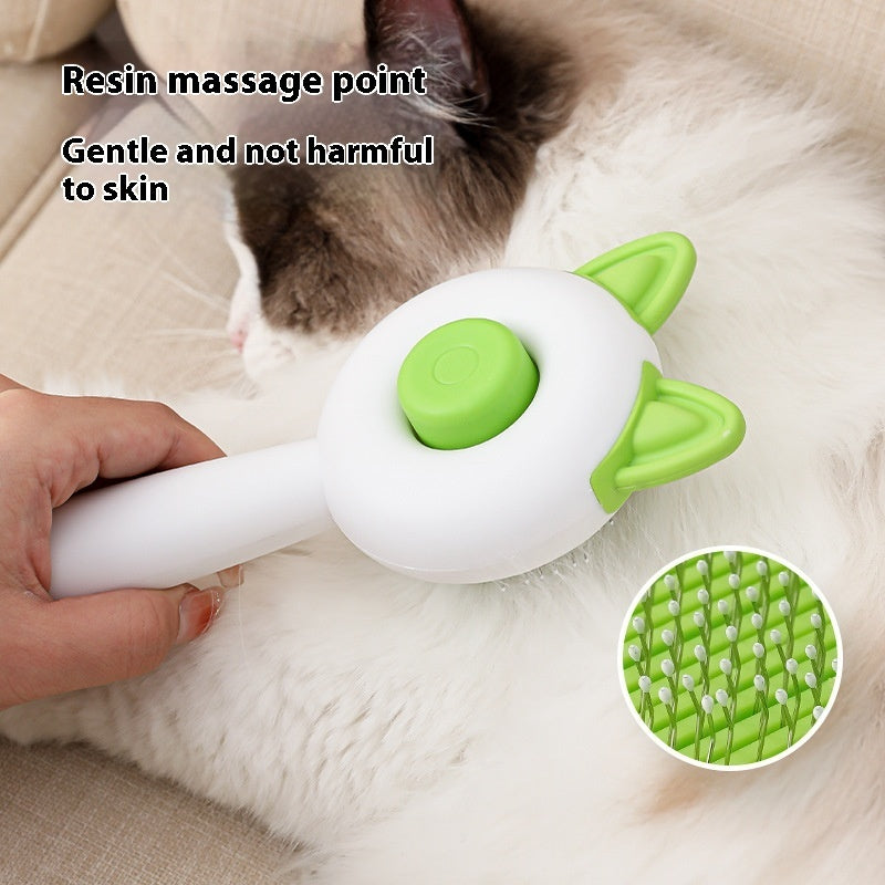 Shopi Vella self cleaning pet brush with resin massage points gently grooming white cat fur