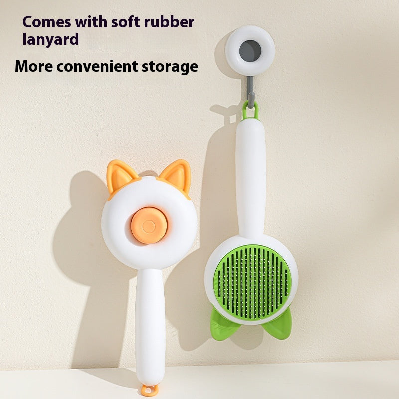 Shopi Vella self cleaning pet brush with soft rubber lanyard for convenient storage and easy grooming