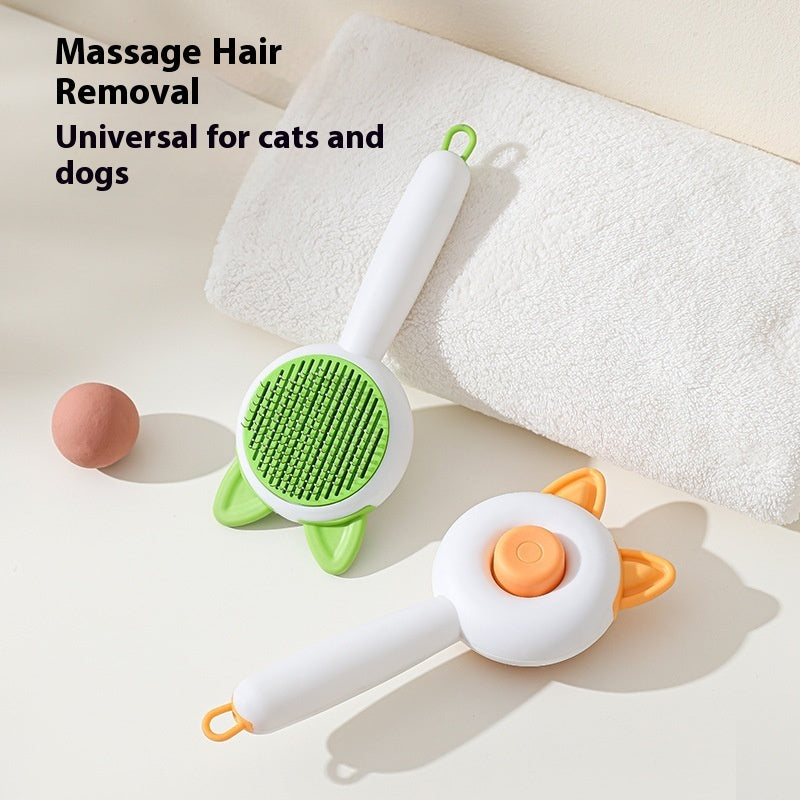 Shopi Vella self cleaning pet brush with green bristles and white handle for cats and dogs