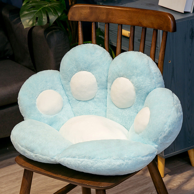 Light blue semi surrounded cushion office chair with white accents by Shopi Vella on wooden chair