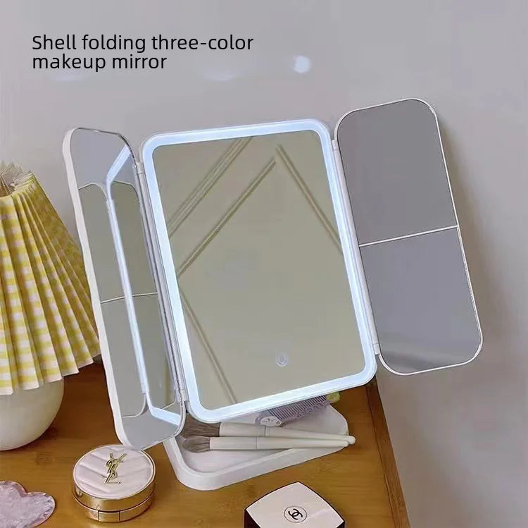 Shell design makeup mirror with lights featuring three folding panels and touch control for adjustable lighting