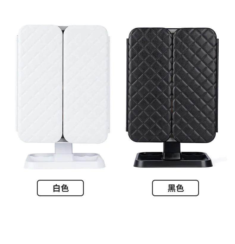 White and black shell design makeup mirror with lights featuring a quilted pattern and foldable panels