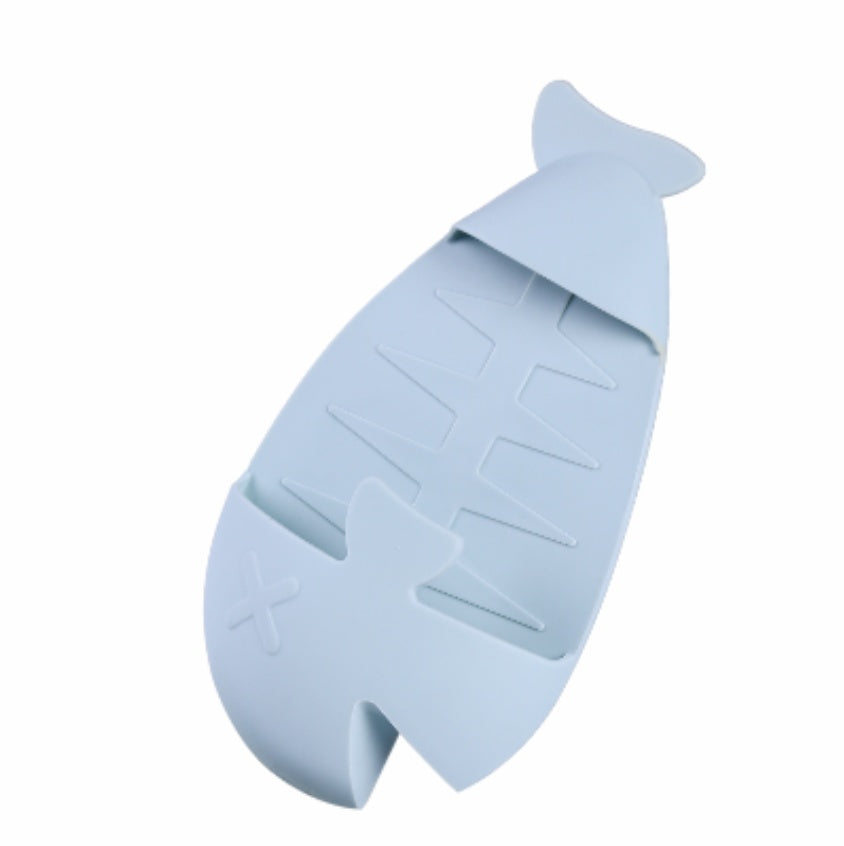 Shopi Vella silicone floor drain with hair catcher in light blue fishbone design for home storage