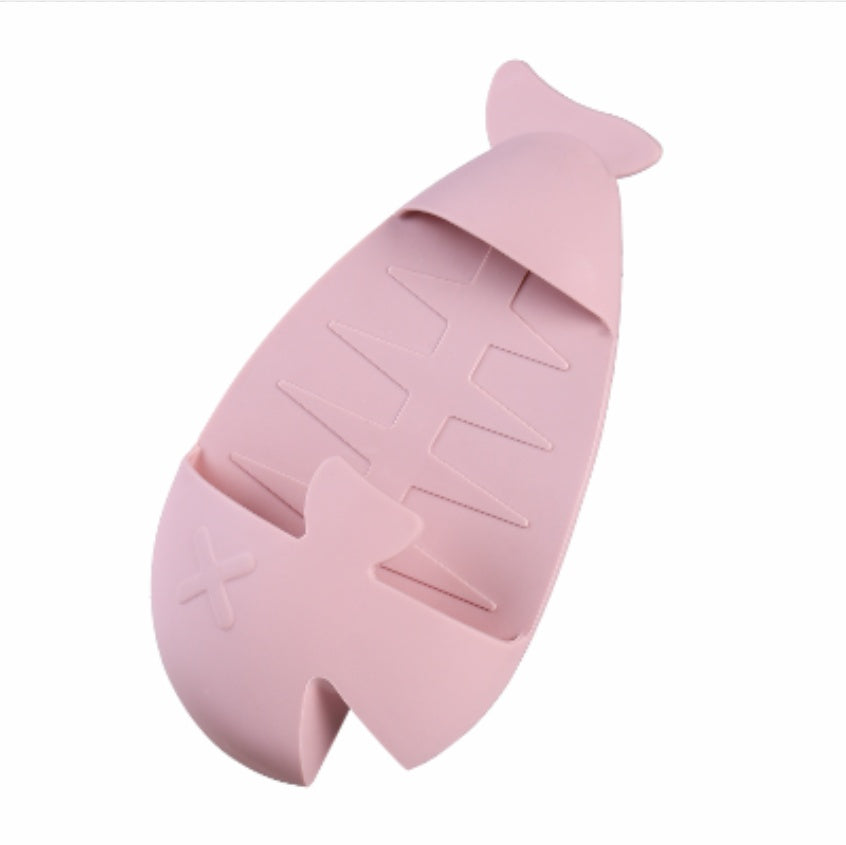 Shopi Vella pink silicone floor drain with hair catcher shaped like a fish for home storage
