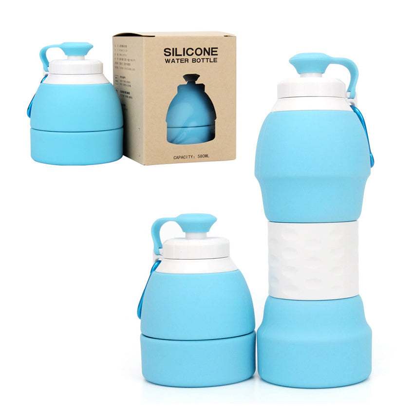 Shopi Vella blue silicone folding water bottle shown folded and expanded with packaging box