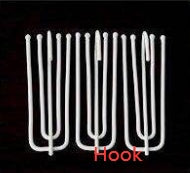 White metal hooks for simple blackout curtains by Shopi Vella, designed for easy installation