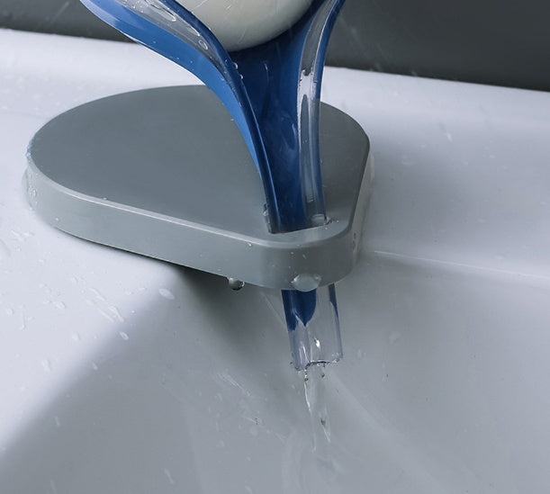 Shopi Vella gray sink sponge drain box attached to a sink draining water efficiently