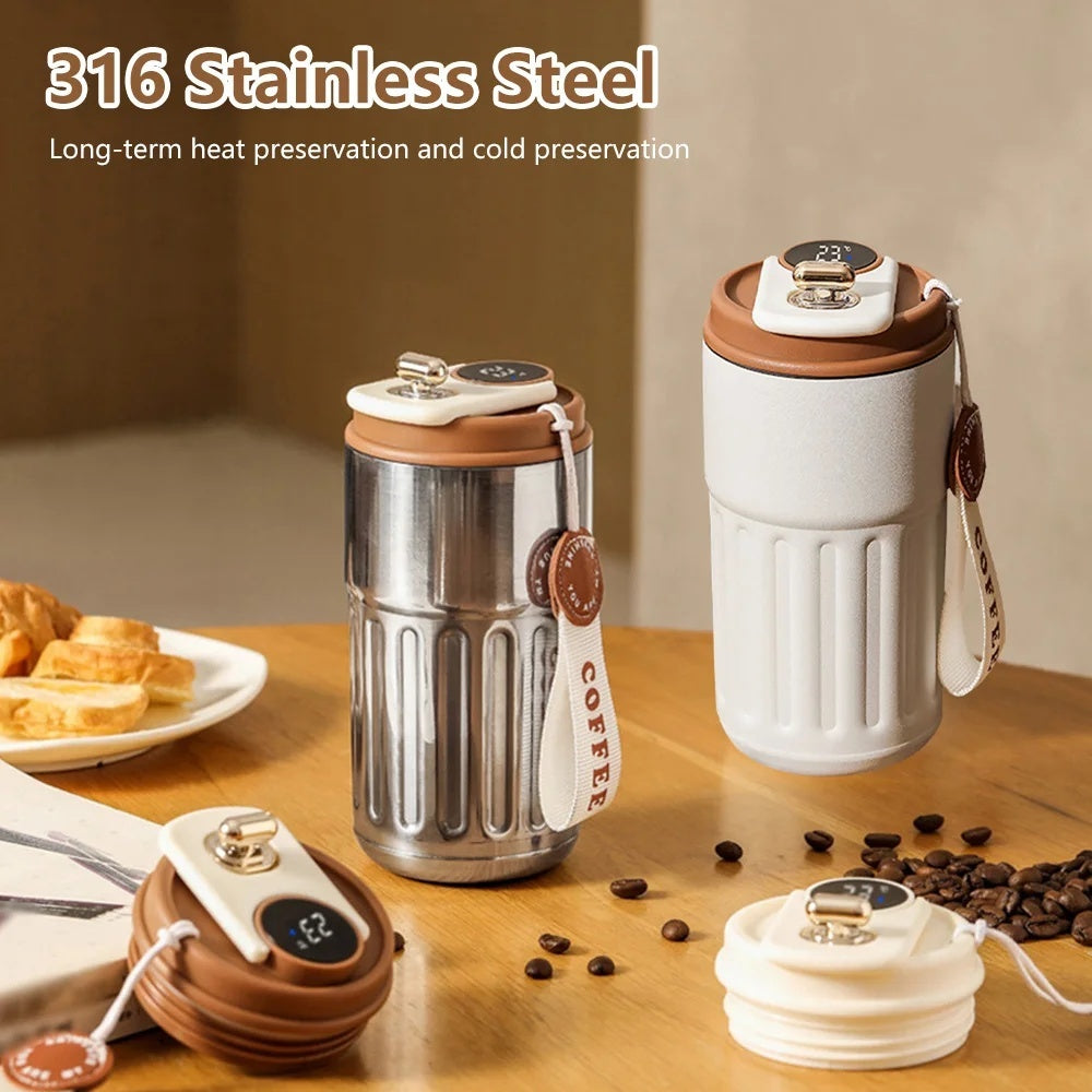 Shopi Vella smart thermal coffee mug in stainless steel and white with temperature display and coffee strap