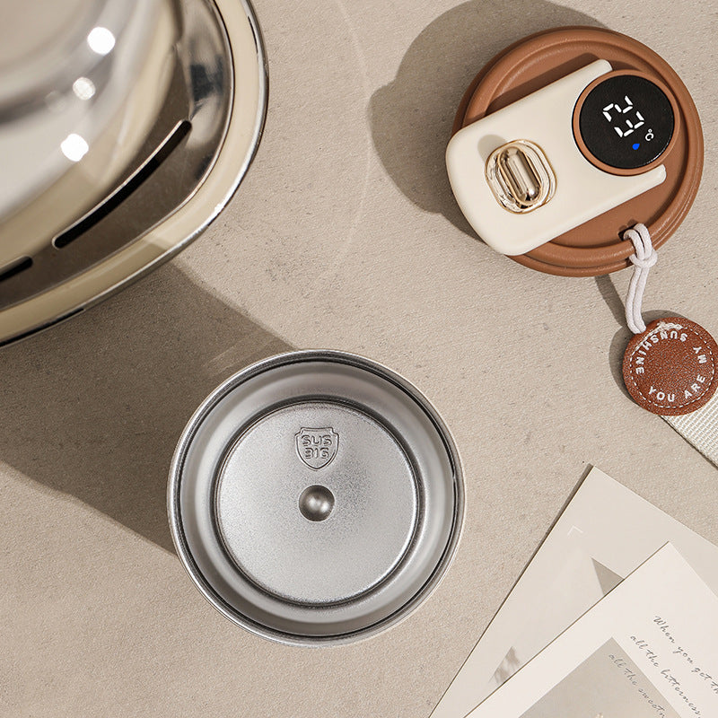 Shopi Vella smart thermal coffee mug lid with temperature display and stainless steel cover