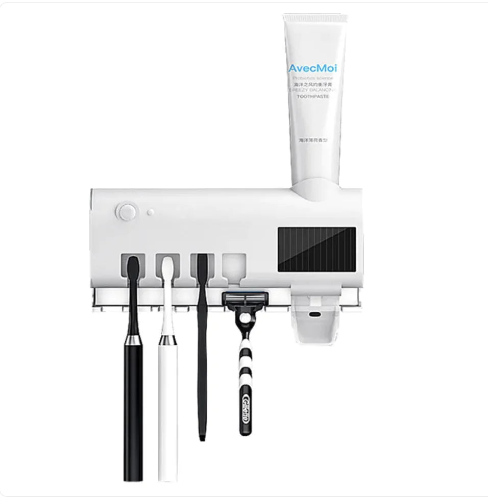 White smart toothbrush sterilizer with slots for toothbrushes and toothpaste dispenser