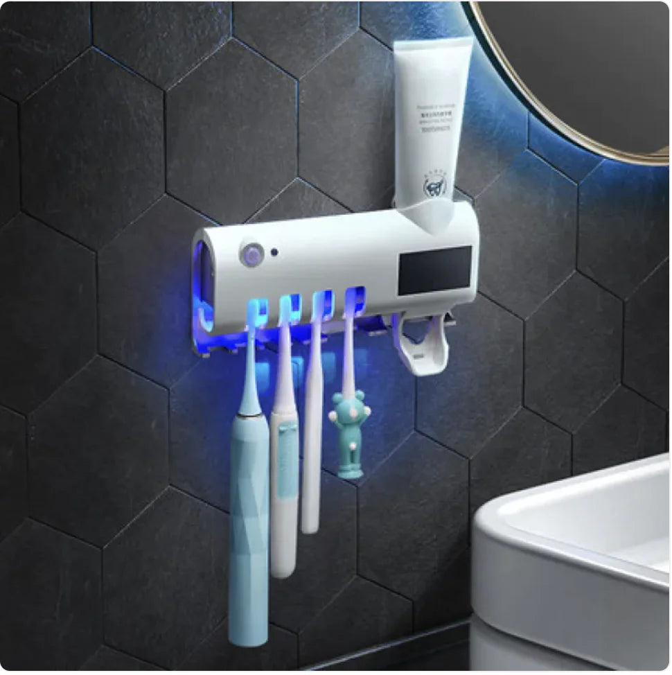Wall-mounted smart toothbrush sterilizer with UV light holding multiple electric toothbrushes and toothpaste