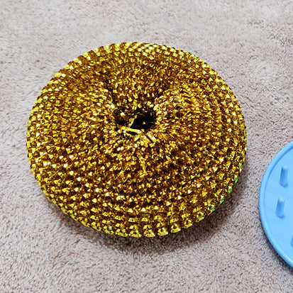 Round golden scouring pad for kitchen cleaning from Shopi Vella kitchen storage