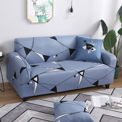 Blue sofa with geometric pattern and sofa cushion cover floral print featuring modern design